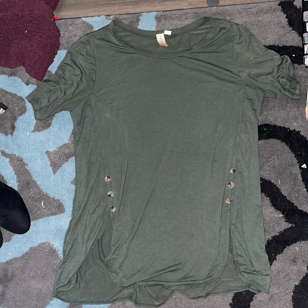 Green shirt with button details and slits